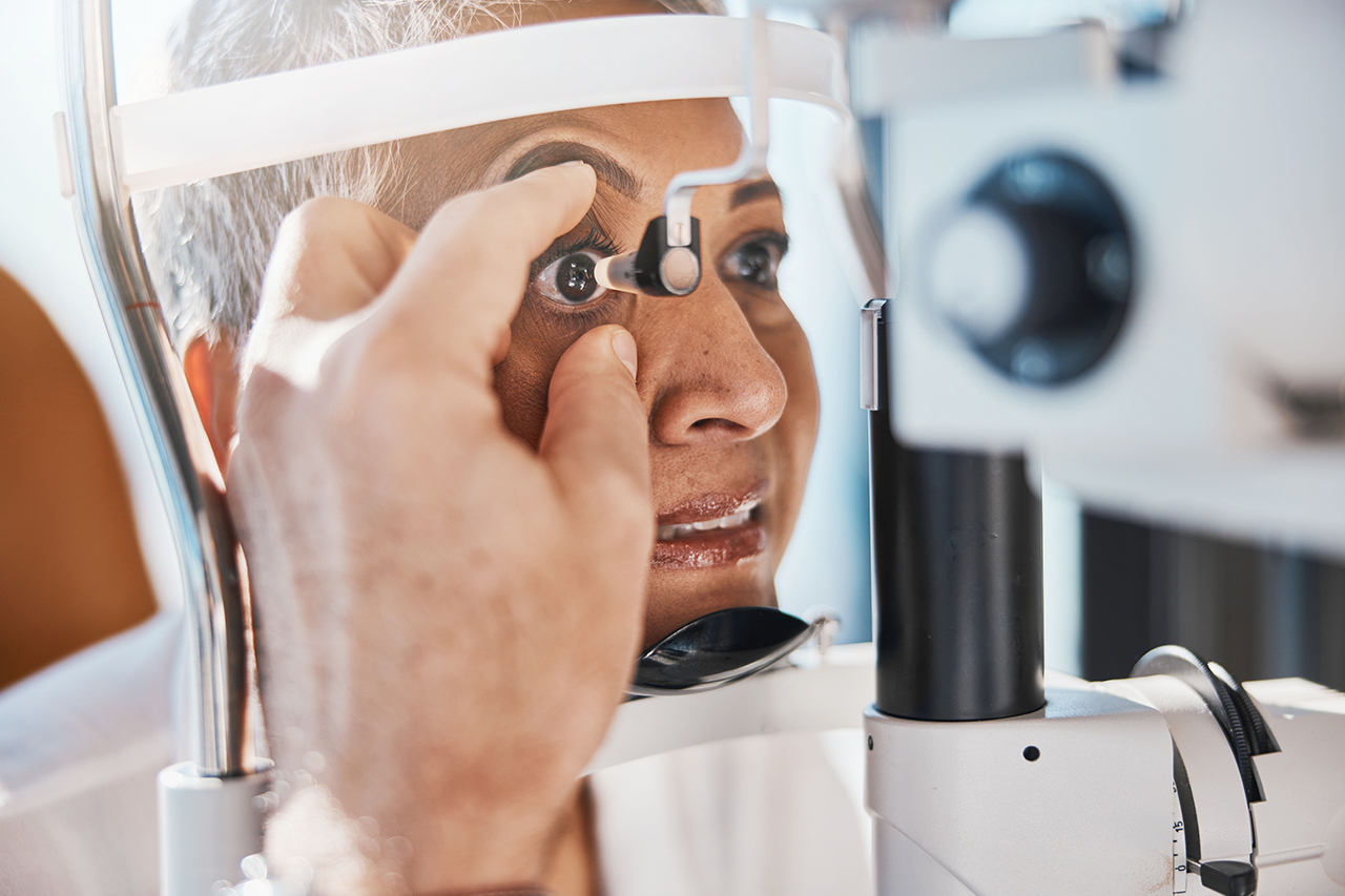 older woman having eyes tested for eye condition
